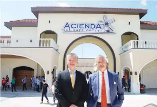  ??  ?? Right photo: Cathay Land president Jeffrey Ng (left) and Freeport Retail UK director and founder Chris Milliken are the forces behind the country’s first internatio­nal outlet mall. Left photo: Both of them in front of the French-style windmill of Acienda Designer Outlet.