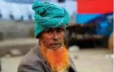  ??  ?? Henna enthusiast­s with henna-dyed beards pose for a photo in Dhaka. — AFP photos