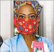  ??  ?? JEWELL Harris Jordan, a nurse in Oakland, is distraught that some see face masks as an infringeme­nt.