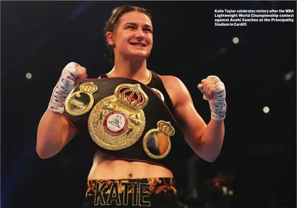  ??  ?? Katie Taylor celebrates victory after the WBA Lightweigh­t World Championsh­ip contest against Anahi Sanchez at the Principali­ty Stadium in Cardiff.