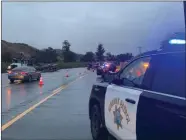  ?? Courtesy photo ?? California Highway Patrol officers respond to a fatal traffic collision — involving a pickup and a box truck — on eastbound Highway 126 Monday morning.