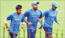  ??  ?? Vice Captain of Indian cricket team Rohit Sharma with teammates during a practice session ahead of the first ODI match against Australia on Saturday