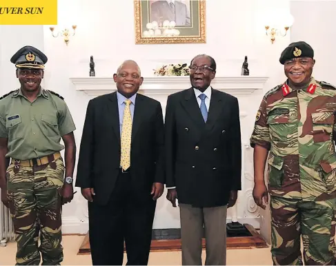  ?? AFP PHOTO / ZBC ?? Zimbabwe President Robert Mugabe, second from right, poses alongside Zimbabwe Defence Forces Commander General Constantin­o Chiwenga, right, and South African envoys at State House in Harare. Chiwenga is the head of the armed forces who ordered the...