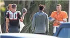  ?? AP ?? Tampa Bay quarterbac­k Tom Brady (far right) talks with teammates during a private workout Tuesday.