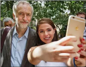  ??  ?? Selfie star: Mr Corbyn with a fan at London’s Hiroshima event yesterday