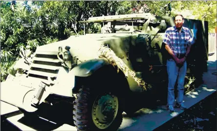  ?? PHOTO BY DAVID KRUMBOLTZ ?? Lafayette resident Dennis Reid appears with his 17,000-pound 1944 Model M3 Army Halftrack.