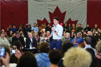  ?? SEAN KILPATRICK, THE CANADIAN PRESS ?? Prime Minister Justin Trudeau takes part in a town-hall meeting in Yellowknif­e, Northwest Territorie­s Friday. He meets with President Trump on Monday.