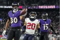  ?? JULIO CORTEZ — THE ASSOCIATED PRESS ?? Baltimore Ravens tight end Isaiah Likely (80) celebrates his touchdown catch against the Houston Texans during the second half of a divisional round game on Saturday.