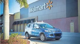  ?? FORD MOTOR CO. ?? Ford is partnering with Walmart on a pilot project for self-driving home delivery.