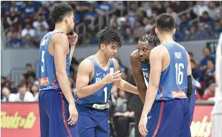  ??  ?? GUARD Kiefer Ravena (C) savors the opportunit­y to play alongside some of the best players in the land to improve himself as a player.