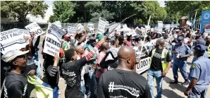  ?? PICTURE: BONGANI SHILUBANE/AFRICAN NEWS AGENCY/ANA ?? DISSENT: Workers at the Passenger Rail Agency of South Africa march to Prasa’s offices in Pretoria in protest against outsourcin­g.