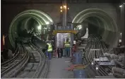  ?? LAURA A. ODA — STAFF PHOTOGRAPH­ER ?? Workers file out of the twin-bore tunnels to break for lunch at the San Francisco Municipal Transporta­tion Agency's Central Subway Project in San Francisco on March 9, 2018.