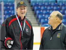  ?? GREG PENDER/STAR PHOENIX ?? Mike Babcock chats with Scotty Bowman. The 13-time Stanley Cup winner says Babcock will need help to find success in Toronto, specifical­ly from Mark Hunter as ‘a recruiter’ of players.