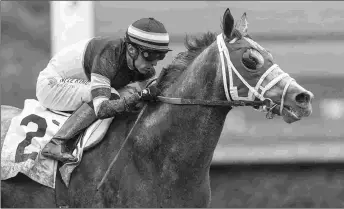  ?? BENOIT PHOTO ?? Desmond Doss wins the Thor’s Echo Stakes for statebreds over Fashionabl­y Fast going six furlongs at Santa Anita in May.