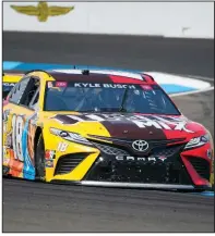  ?? (AP/Michael Conroy) ?? Kyle Busch said he prefers racing on the oval track at Indianapol­is Motor Speedway rather than on the road course. Busch called the road course “a parking lot” after a subpar practice session.