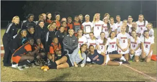  ??  ?? STAFF PHOTO BY ANDY STATES The North Point and Northern girls soccer teams pose with their division championsh­ip plaques after playing to a scoreless tie in the SMAC championsh­ip game on Tuesday night at Northern.