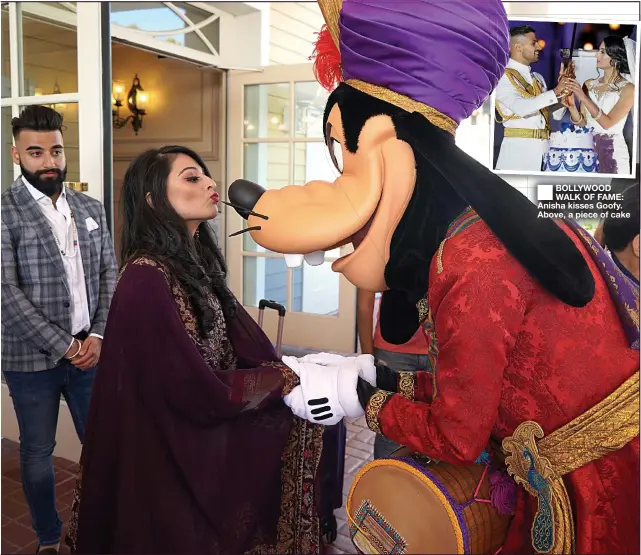  ??  ?? ■
BOLLYWOOD WALK OF FAME: Anisha kisses Goofy. Above, a piece of cake