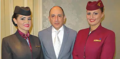  ??  ?? Qatar Airways CEO Akbar Al Baker with cabin crew Bernadet Nagy and Maja Olovcic in Dublin