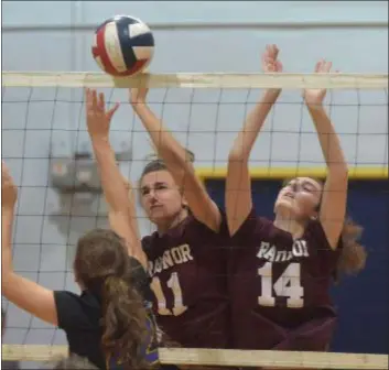  ?? PETE BANNAN – DIGITAL FIRST MEDIA ?? Radnor’s Josie Darrach, left, and Izzy Criscuolo go up for the block against Springfiel­d’s Kate Kubiak in their Central League volleyball match Wednesday. Radnor won, 3-2.
