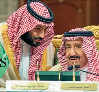  ??  ?? Crown Prince Muhammad bin Salman, left, has absolute power of the country and the support of his elderly father, King Salman.