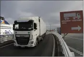  ?? LEWIS JOLY — THE ASSOCIATED PRESS ?? A truck arrives to board the first ferry heading to Britain after Brexit in Calais, northern France, on Friday.