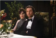  ?? COURTESY OF STXFILMS ?? Michelle Dockery, left, and Matthew McConaughe­y in a scene from “The Gentlemen.”