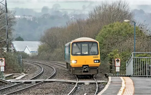  ?? JOHN STRETTON. ?? Arriva Trains Wales 143606 approaches Neath on January 20, with the 1110 Swansea-Cardiff Central. The next Welsh franchise is under such scrutiny that one mishap could affect the Welsh Assembly Government’s stability, argues Wolmar.