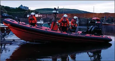  ??  ?? Calm waters: The St Abbs crew head for the North Sea to carry out trials on their lifeboat