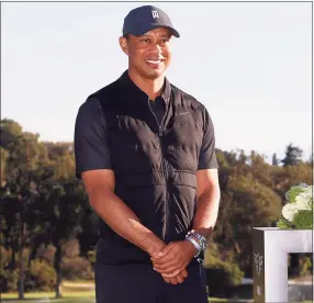  ?? Ryan Kang / Associated Press ?? Golfer Tiger Woods was injured Tuesday in a vehicle rollover and had to be extricated from his car in the Rancho Palos Verdes section of Los Angeles.