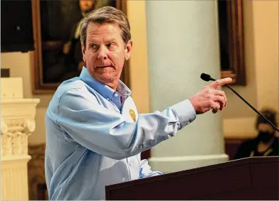 ?? CONTRIBUTE­D BY BEN GRAY ?? Gov. Brian Kemp has been trying to walk a perilous line between pressure to use his emergency powers to enforce more social distancing and conservati­ve activists who resist government interferen­ce.