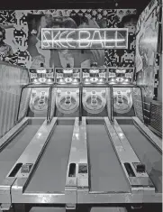  ??  ?? Skee-Ball lanes are featured at Up-Down.