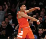  ?? JULIE JACOBSON - THE ASSOCIATED PRESS ?? Syracuse forward Matthew Moyer (2) reacts after dunking the ball against Connecticu­t during the first half of an NCAA college basketball game, Tuesday, Dec. 5, 2017, in New York.