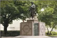  ?? DORAL CHENOWETH — THE COLUMBUS DISPATCH VIA AP ?? The Christophe­r Columbus statue on the Ohio Statehouse grounds is shown on June 22.