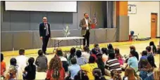  ?? SUBMITTED PHOTO ?? Univest Bank and Trust Co. teaches students about financial literacy and the importance of developing lifelong savings habits. In this photo, Greg Taber, senior vice president and east group area manager at Univest Bank and Trust Co., and Jeff Schweitzer, president and CEO at Univest Corp., are pictured with third grade students at Mill Creek Elementary School in Levittown.