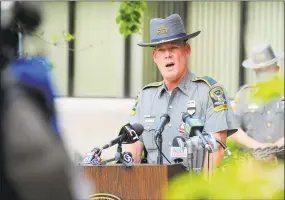  ?? Christian Abraham / Hearst Connecticu­t Media ?? Lt. Michael Pendleton, commanding officer of the Connecticu­t State Police Central District, speaks Thursday in Middletown on the arrest of suspect Peter Manfredoni­a.