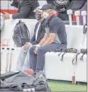  ?? Heidi Fang Las Vegas Review-journal @Heidi Fang ?? Owner Mark Davis, left, and general manager Mike Mayock watch as the Raiders go through pregame drills before a game last season.