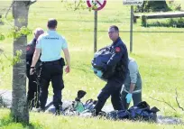  ?? Bob Edme / AP Photo ?? French police officers collect bags at a hideout used by ETA in Saint Pee sur Nivelle, south-west France, yesterday.