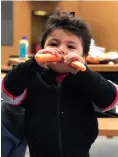  ??  ?? Fun with carrots during a Brighter Bites bagging session at Eden Park Elementary