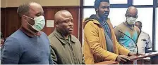  ?? ?? Menzi Bulose ,43, Mathews Ntjonto, 51, Mtjokozisi Gwala, 37, and Siboniso Ngubane, 29, appeared at the Durban High Court on allegation­s of looting during last year’s July unrest. | Tumi Pakkies African News Agency (ANA)