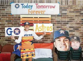  ??  ?? Longtime season-ticket holder Barbara Moon, also known as the “Sign Lady,” is among the Astros faithful who have purchased a cardboard cutout of themselves.