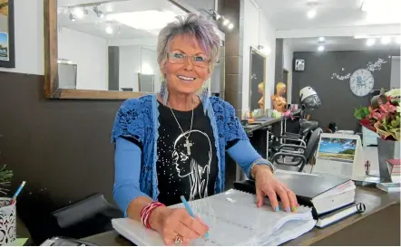 ??  ?? Woodville hairdresse­r Rose Harding has seen hairstyle fashions come, go and come back again with new names in her many years in the business.