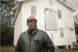  ??  ?? The historian Wayne O’Bryant near the ruins of Hamburg. Photograph: Lynsey Weatherspo­on/The Guardian