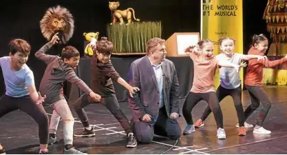  ??  ?? “The Lion King” associate director Anthony Lyn introduces the Filipino members of the cast: (from left) Omar Uddin, Julien Joshua Dolor Jr. and Juan Gabriel Tiongson, alternatin­g as Young Simba; and (from right) Felicity Napuli, UmaMartin and Sheena...