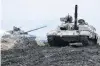  ?? PHOTO: REUTERS ?? Tanks of the Ukrainian Armed Forces are seen during drills at an unknown location near the border of Russianann­exed Crimea, Ukraine, in this handout picture released by the General Staff of the Armed Forces of Ukraine press service yesterday.