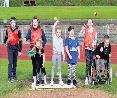  ??  ?? Having a ball These cool kids thoroughly enjoyed the Inspire Athletics Festival sessions at Dam Park