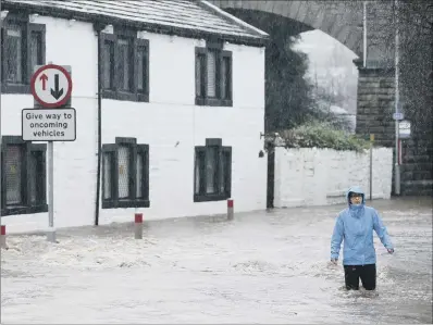  ?? PICTURE: PA. ?? DELUGE: Flooding at Mytholmroy­d on Boxing Day 2015, which followed torrential downpours.