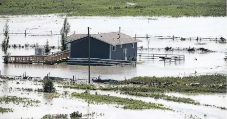  ?? JONATHAN HAYWARD/THE CANADIAN PRESS/FILES ?? 1,100 Siksika Nation members were affected by the 2013 flood and 138 homes had to be replaced.