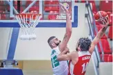  ??  ?? fiba.basketball Iran’s Arsalan Kazemi (R) goes up for the basket against Mohammed al-khafaji of Iraq in a 2019 FIBA Basketball World Cup Asian Qualifiers fixture in Amman, Jordan on November 24, 2017.