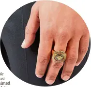  ??  ?? emblem rings are a perennial favourite of fashion labels like Versace. Can you carry it off? — Versace
