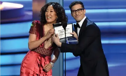  ??  ?? Sandras Oh and Andy Samberg present an award at the 2018 Golden Globes. Photograph: Kevin Winter/Getty Images